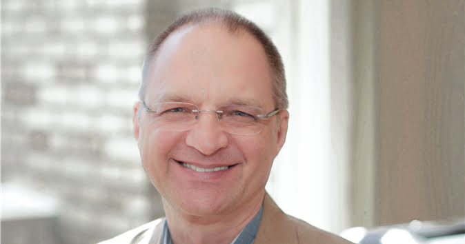 Image of Psychiatrist Edward Haas in his office. 